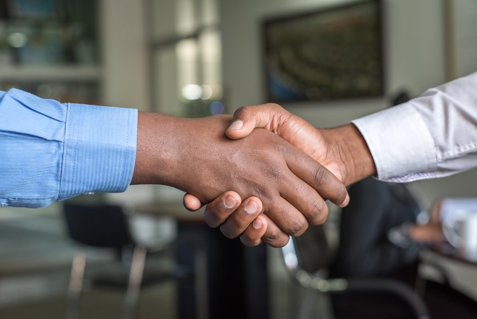 Affiliate disclosure business partnership handshake
